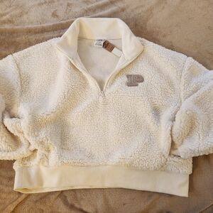 Juniors size medium PINK pull over.